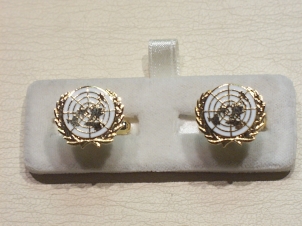 UN white enamelled cufflinks - Click Image to Close